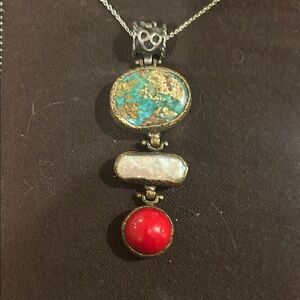 Vintage Southwestern-style multi-stone statement pendant.